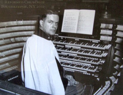 ["Doc" Davis at the cosole of the Cadet Chapel Organ]