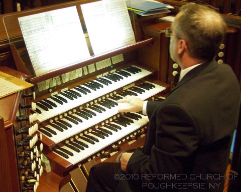 [George Tilley at the Davis Organ Console]